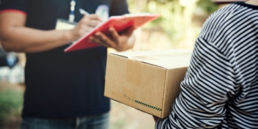 Close up woman holding box with Service delivery and holding a b