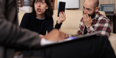 Angry wife accusing husband of cheating and marriage betrayal