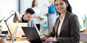 medium-shot-woman-working-laptop