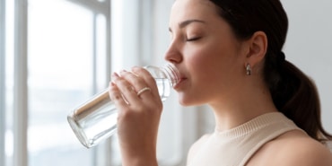 woman-drinking-water-after-exercise