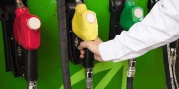 man-putting-gasoline-fuel-into-his-car-pump-gas-station-1