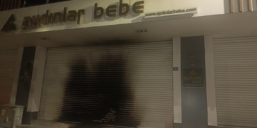 BURSA'DA MAĞAZAYI ATEŞE VEREN ŞAHIS VİDEO ÇEKTİ HEM KUNDAKLADI HEM VİDEO ÇEKTİ