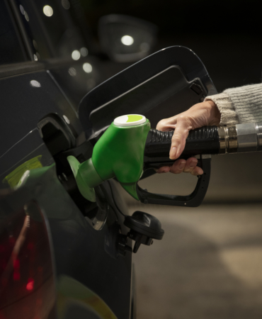 close-up-hand-holding-gas-pump