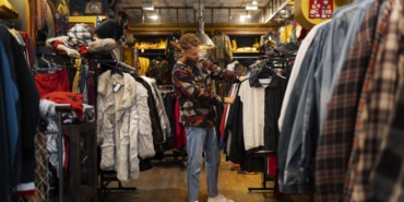 man-looking-clothes-full-shot