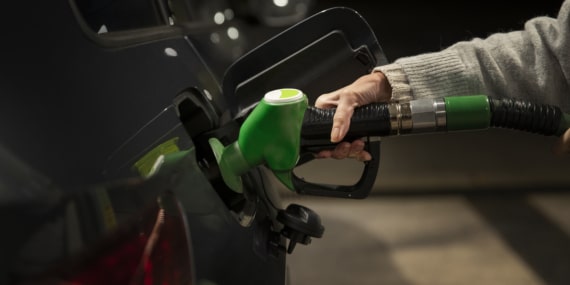 close-up-hand-holding-gas-pump