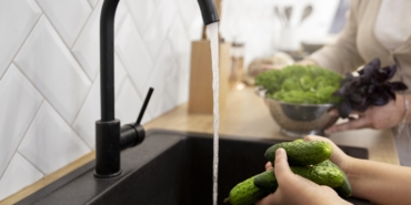 close-up-hands-washing-cucumbers-scaled-1-1-1-1-1-1