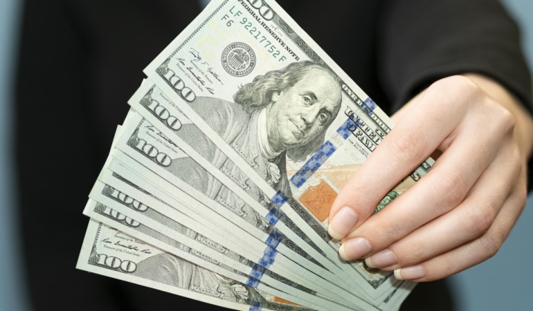 front-view-person-holding-money
