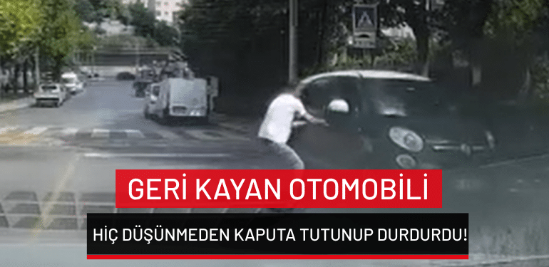 İstanbul’da geri kayan otomobili hiç düşünmeden kaputa tutunup durdurdu!