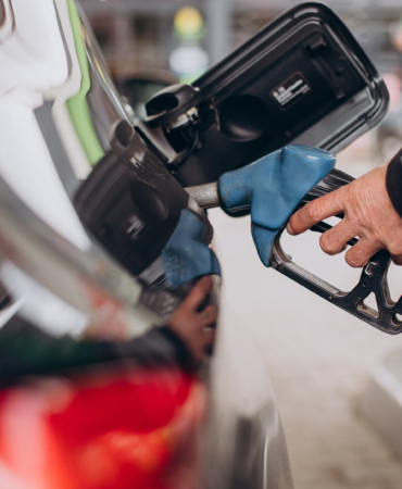 Car refueling at fuel station