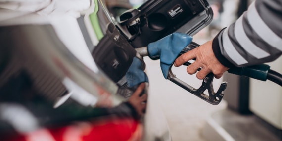 Car refueling at fuel station
