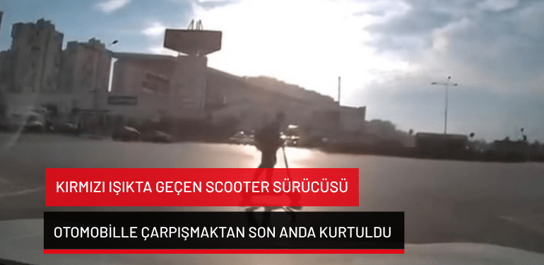 Bursa’da kırmızı ışıkta geçen scooter sürücüsü otomobille çarpışmaktan son anda kurtuldu